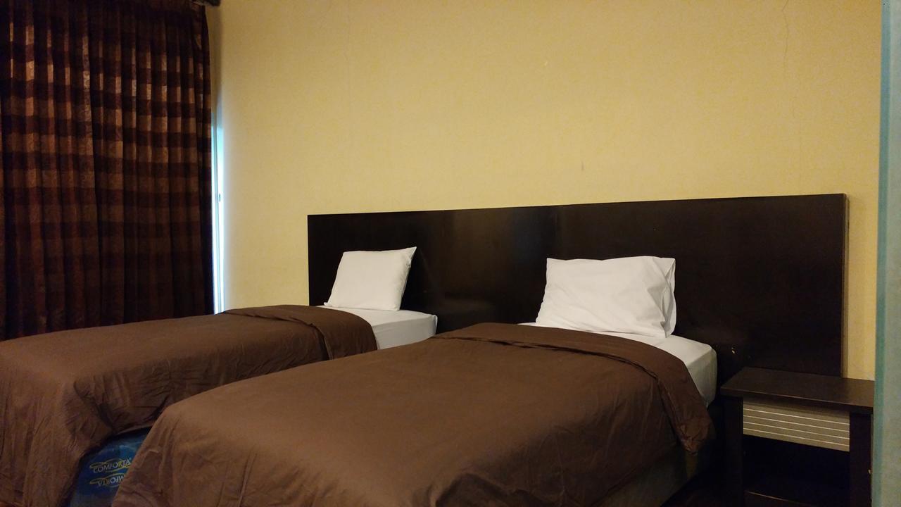 Quint Hotel Manado Exterior foto
